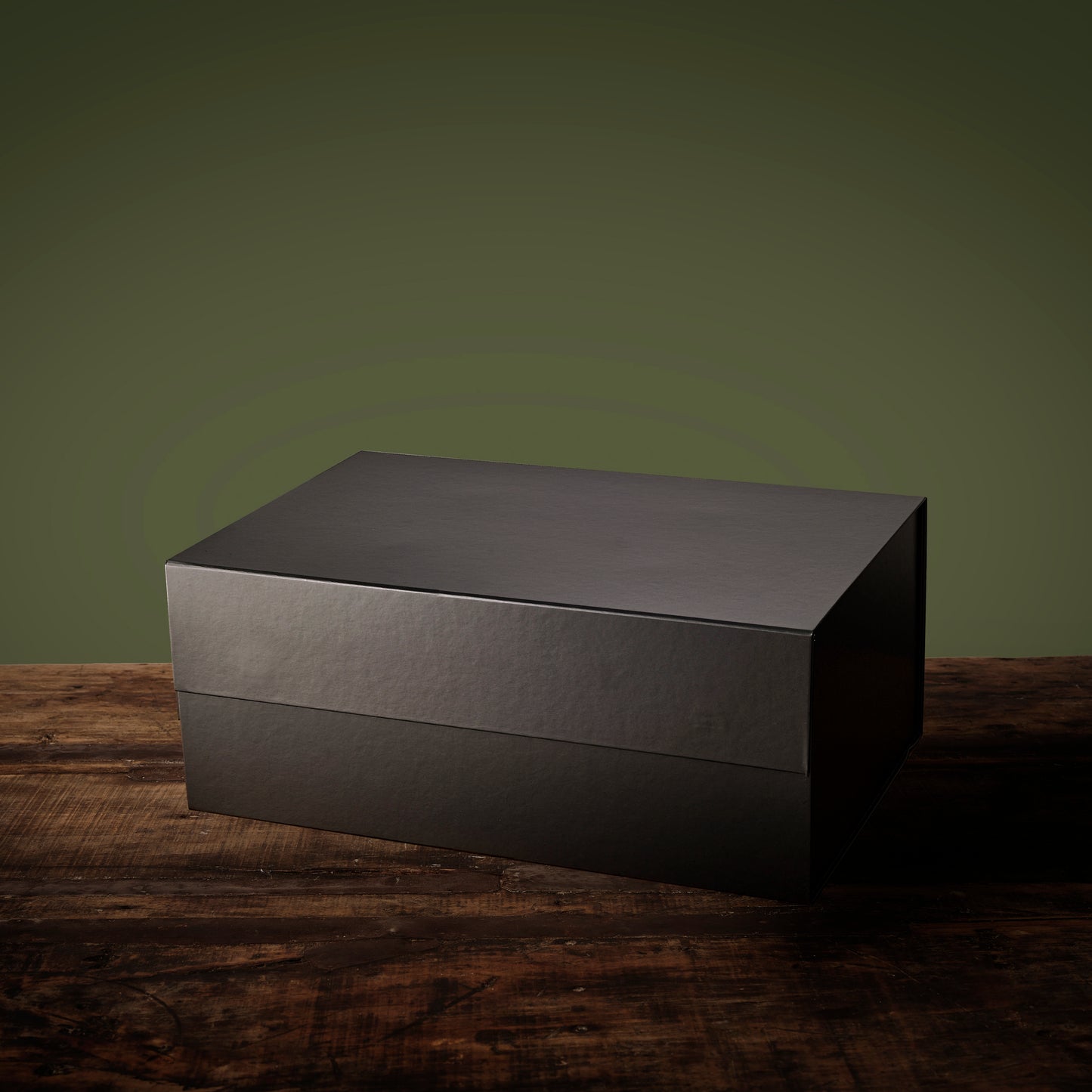 Matte black rectangular gift box for Thinking of Mum Hamper on a wooden table