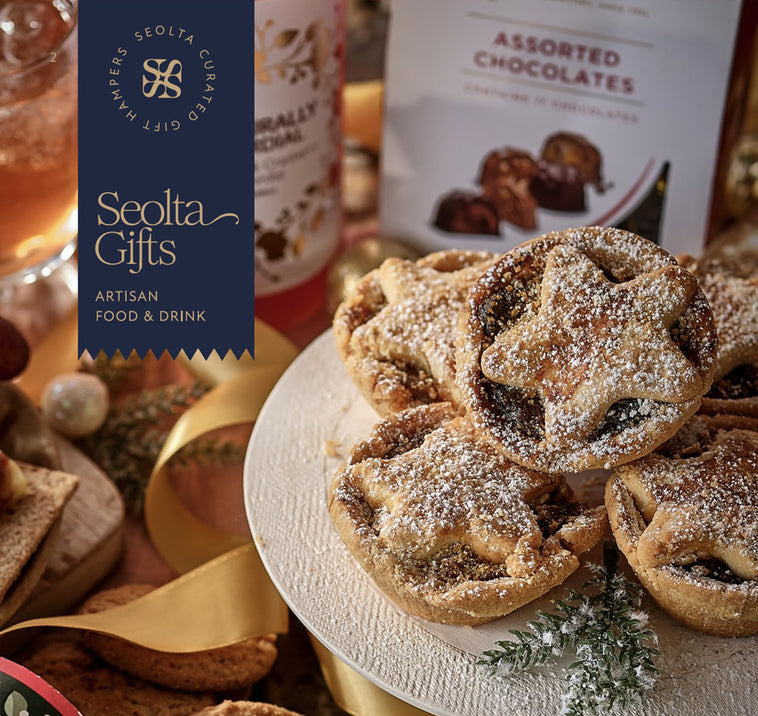 Assorted mince pies on a stand with Seolta Gifts branding in the corner.