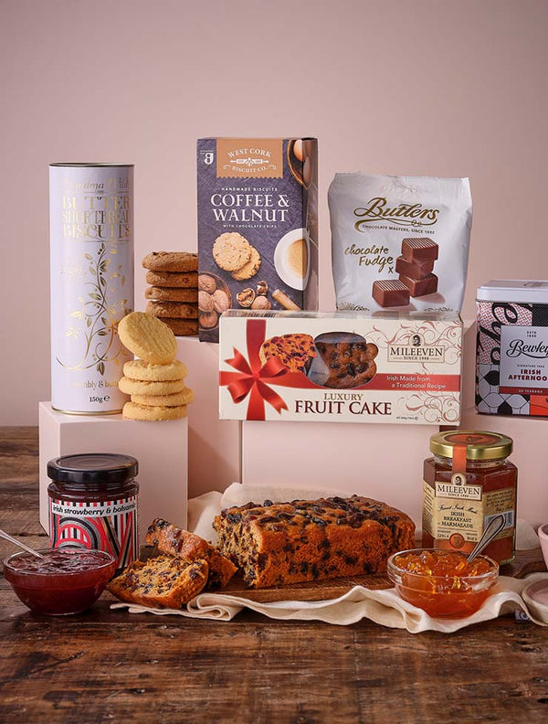 Assorted snacks, spreads and chocolates on a wooden table 